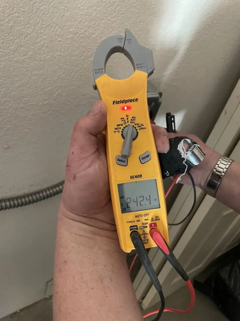 Voltage testing with clamp meter during Electrical Installation Services in Fruit Hill